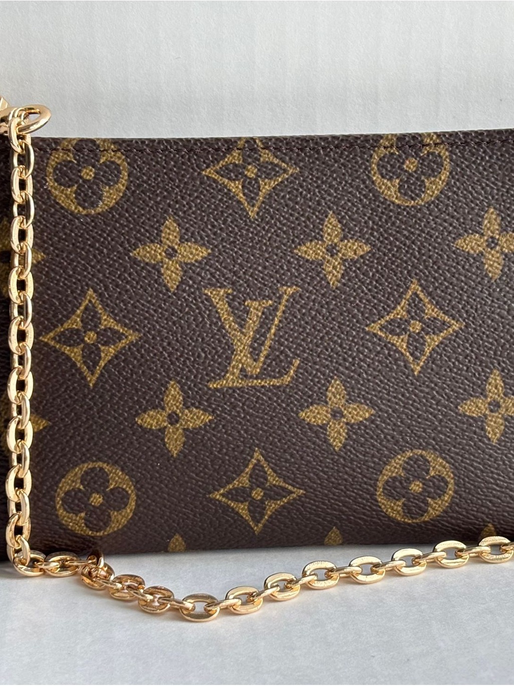Louis Vuitton Monogram Canvas Chain Wristlet In Brown And Gold-Tone
